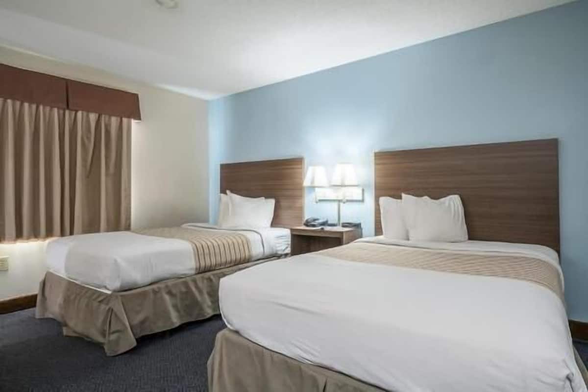 Pillow-top beds, blackout curtains, iron/ironing board, free WiFi
