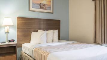 Standard Room, 1 Queen Bed, Smoking | Pillowtop beds, blackout drapes, iron/ironing board, WiFi (free)