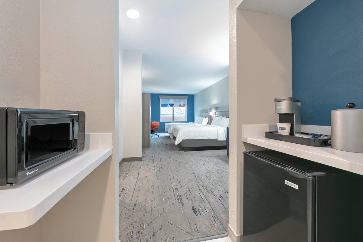 desk, blackout curtains, iron/ironing board, free cots/infant beds