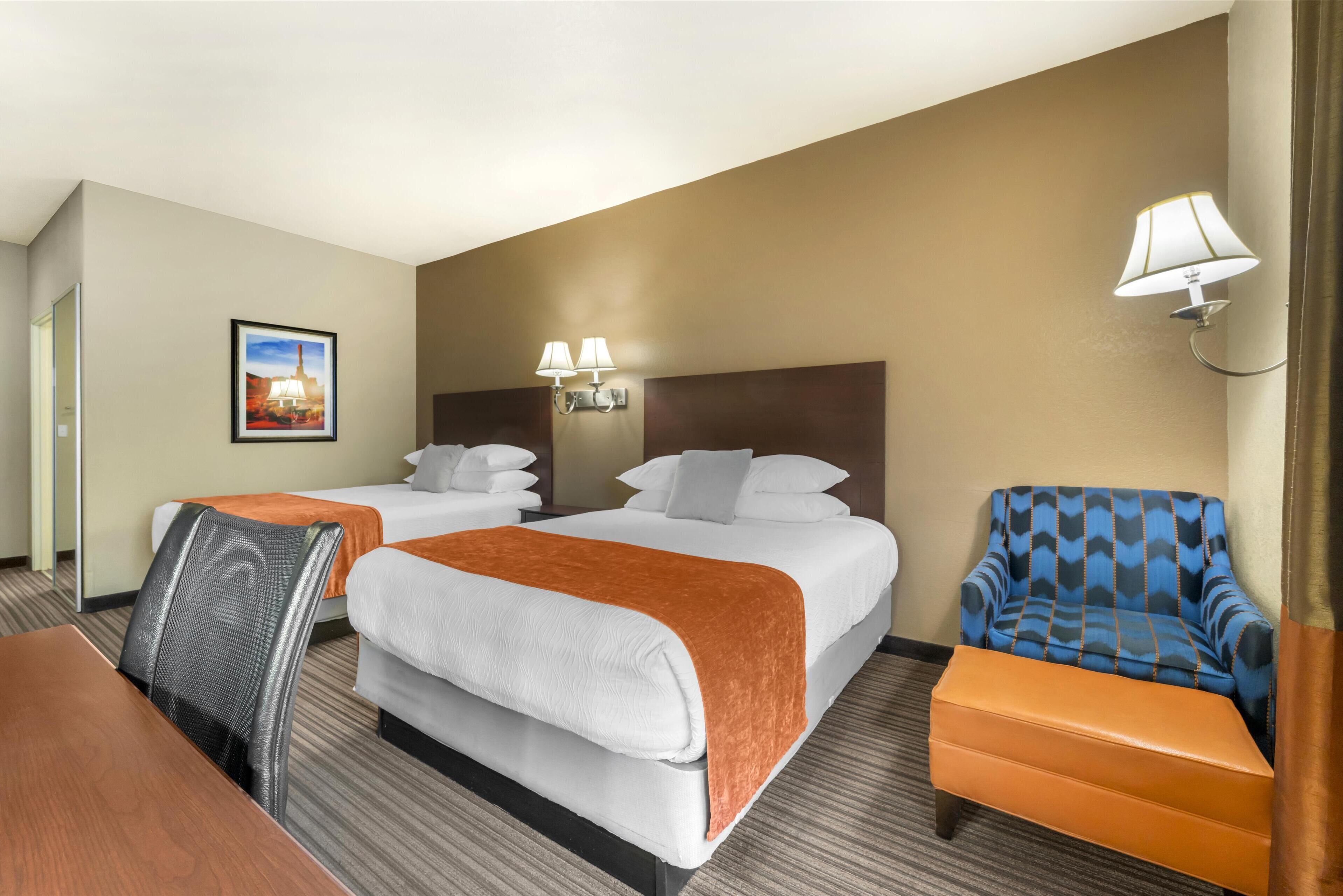 standard room, 2 queen beds, non smoking, refrigerator | in-room safe, desk, iron/ironing board, free wifi