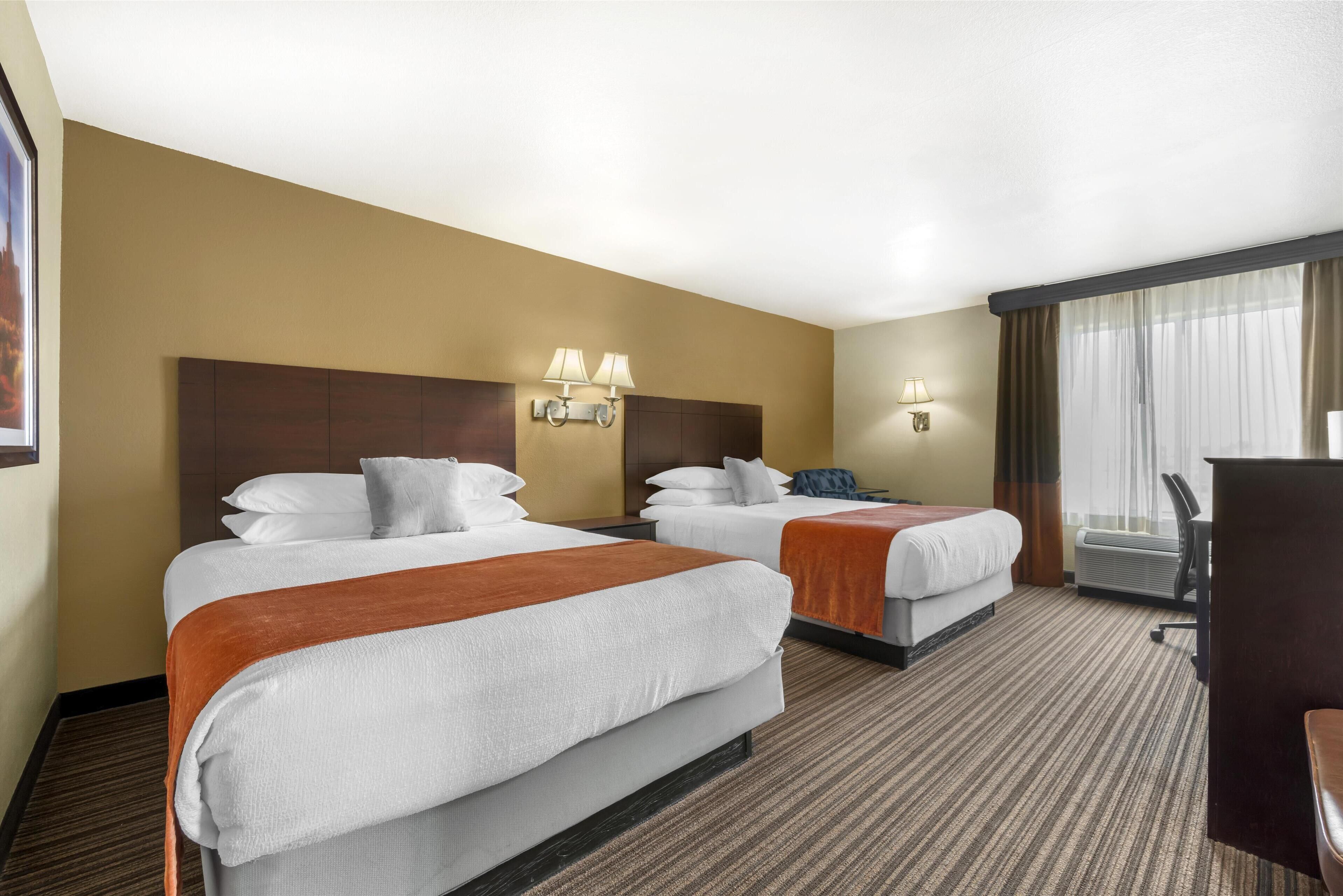 suite, multiple beds, non smoking, refrigerator (with sofabed) | in-room safe, desk, iron/ironing board, free wifi