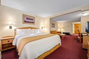 Suíte, 1 cama King, para não fumantes | Escrivaninha, ferros/tábuas de passar roupa, Wi-Fi de cortesia