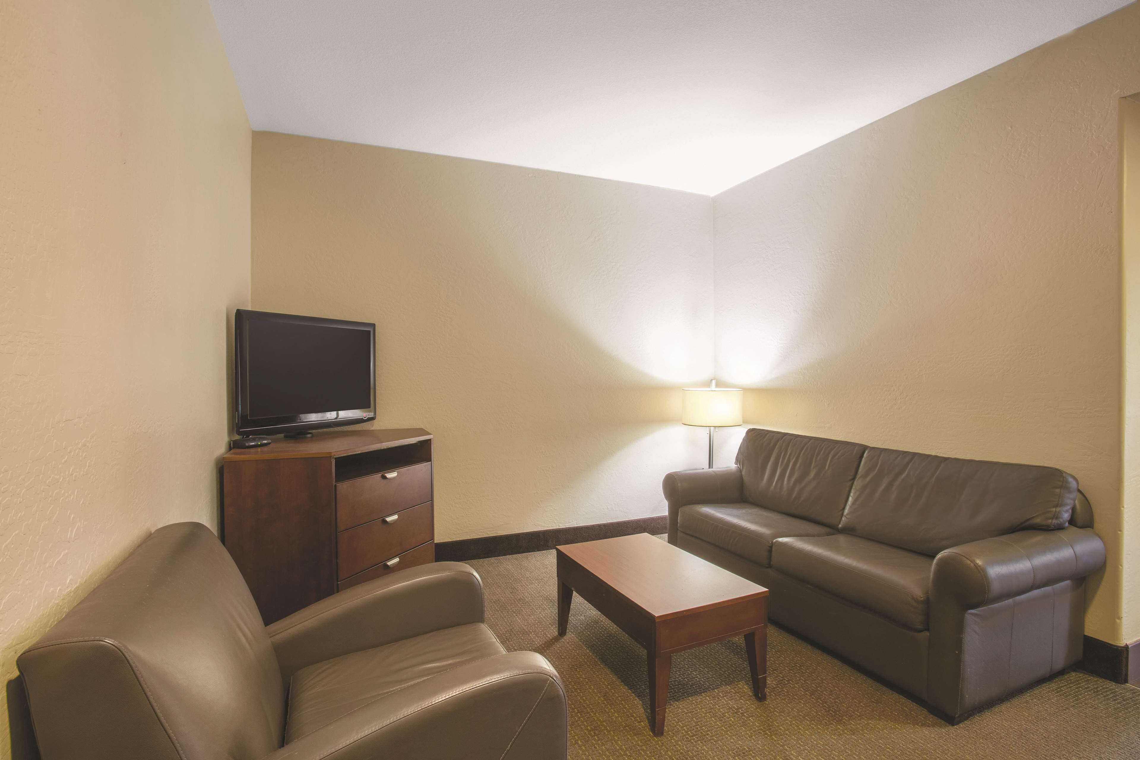 suite, 1 king bed, non smoking | premium bedding, desk, laptop workspace, iron/ironing board