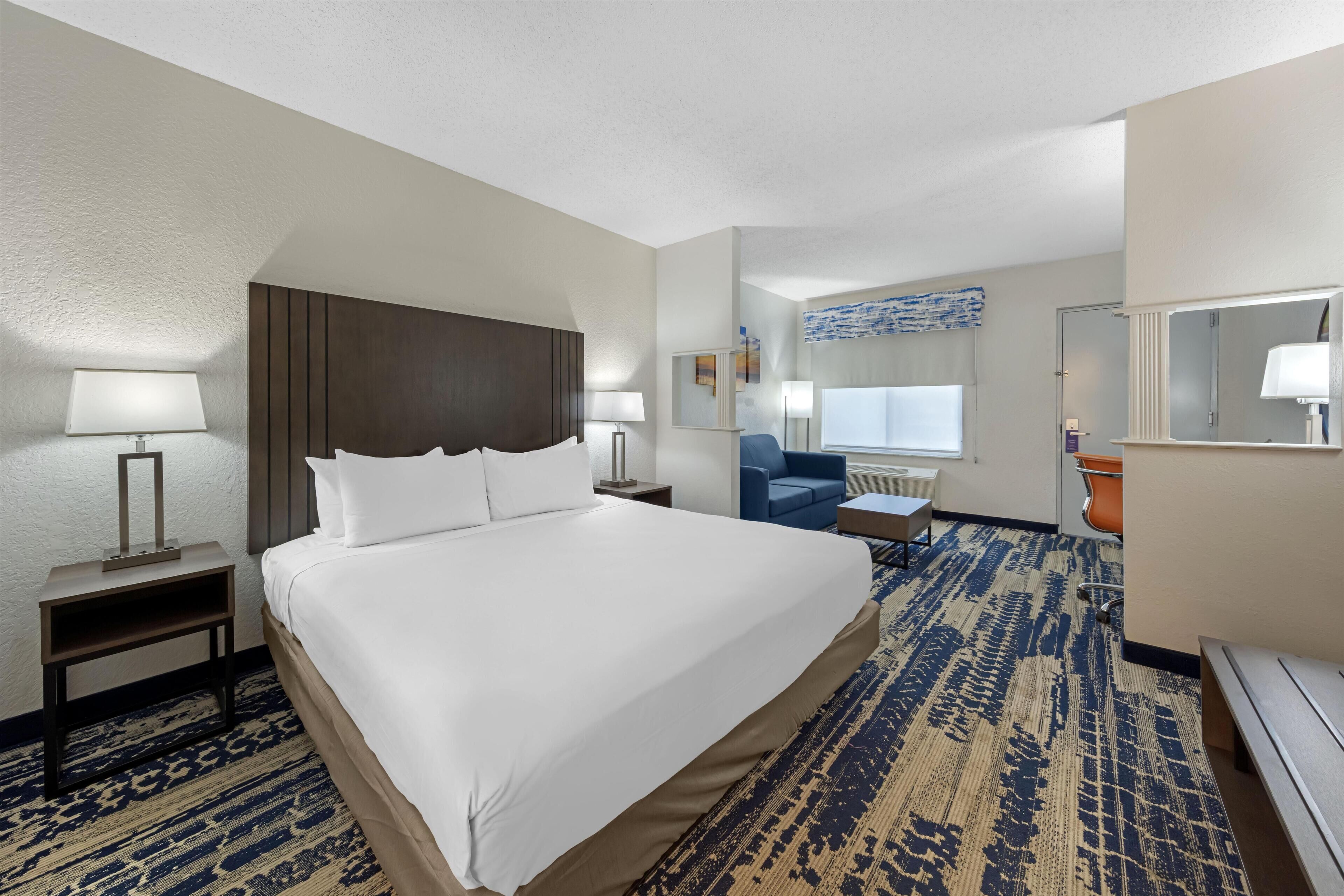 Suite, 1 King Bed, Non Smoking, Refrigerator & Microwave (with Sofabed;Separate Living Room) | Premium bedding, in-room safe, individually furnished, desk