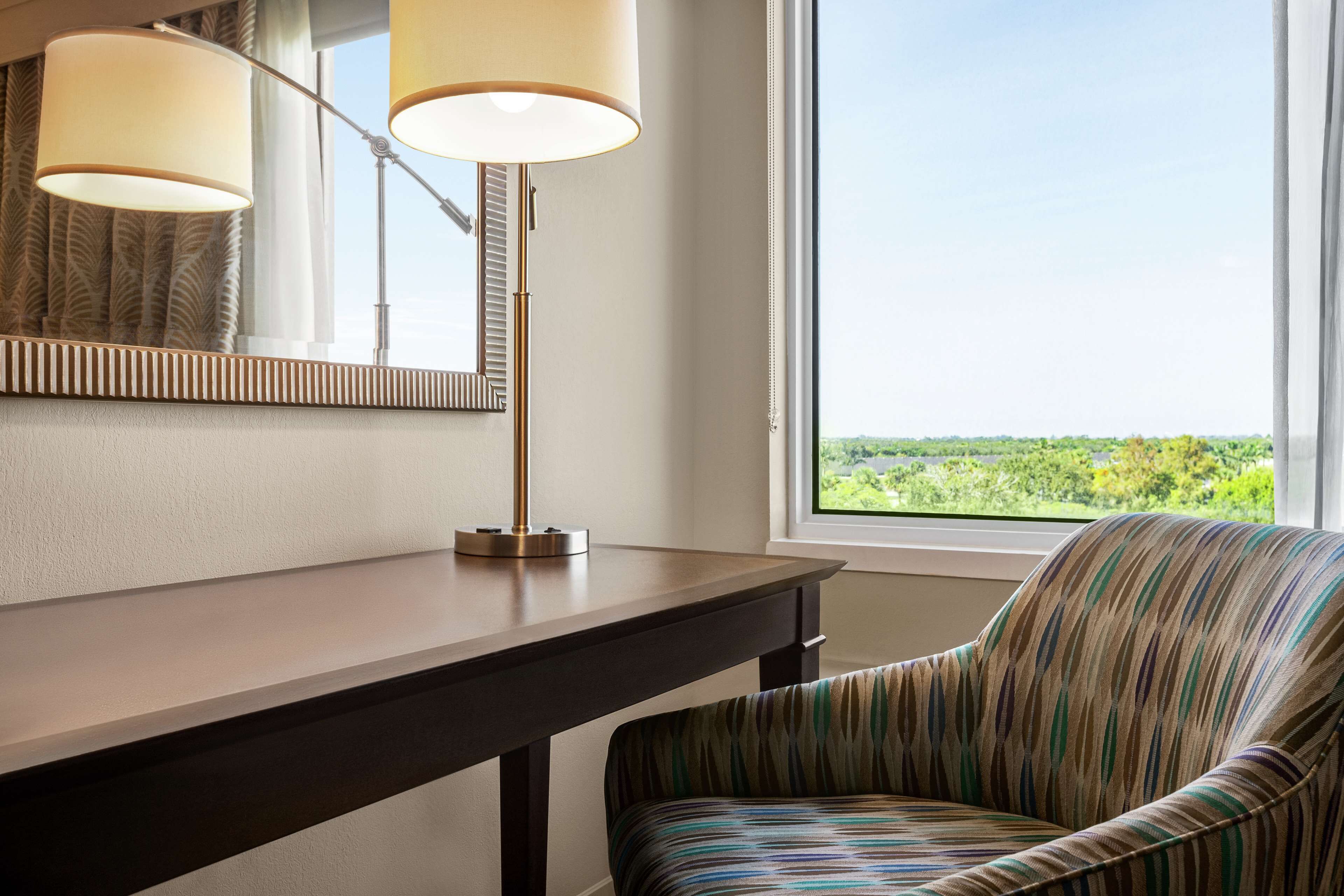 desk, laptop workspace, blackout curtains, iron/ironing board
