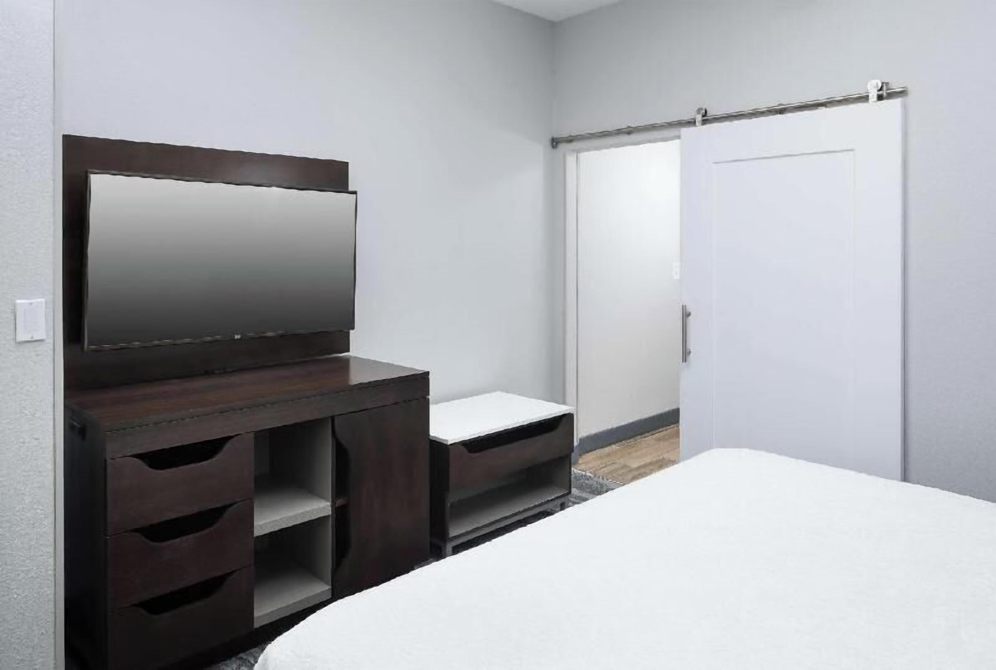 Ropa de cama de alta calidad y tabla de planchar con plancha 