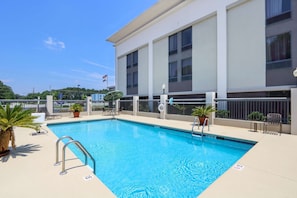 Outdoor pool, open 9:00 AM to 9:00 PM, pool umbrellas, pool loungers