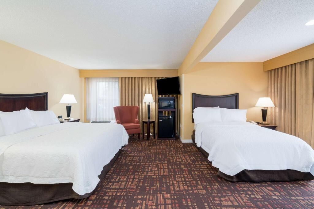 Premium bedding, pillowtop beds, desk, blackout drapes