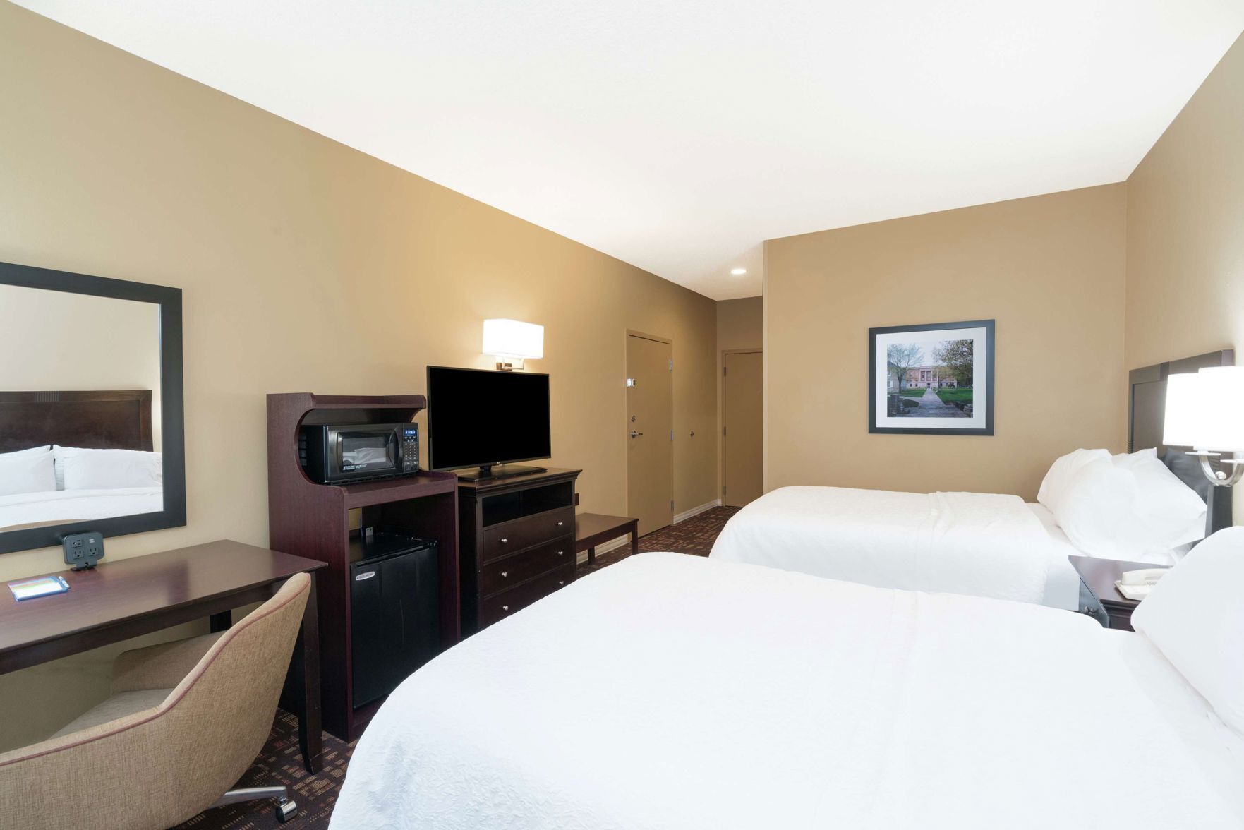 Premium bedding, pillowtop beds, desk, blackout drapes