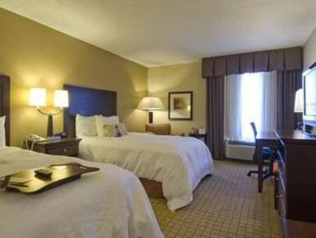 Premium bedding, pillowtop beds, desk, blackout drapes