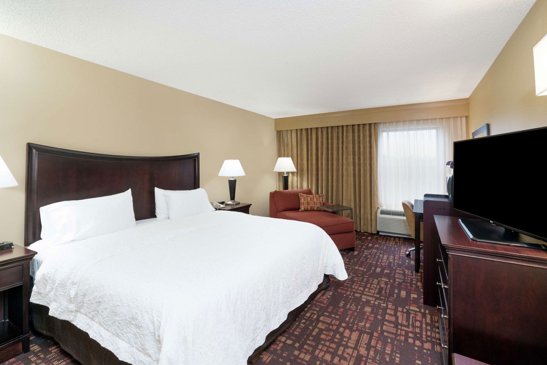 Premium bedding, pillowtop beds, desk, blackout drapes