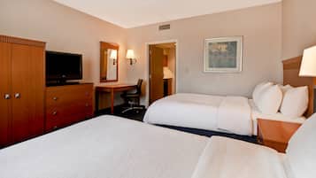 Premium bedding, down comforters, pillowtop beds, in-room safe