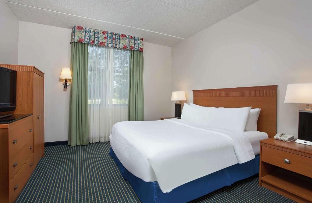 Premium bedding, down duvets, pillow-top beds, in-room safe