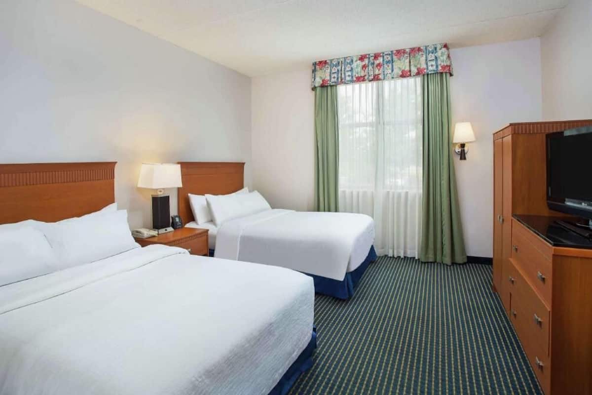 Premium bedding, down duvets, pillow-top beds, in-room safe