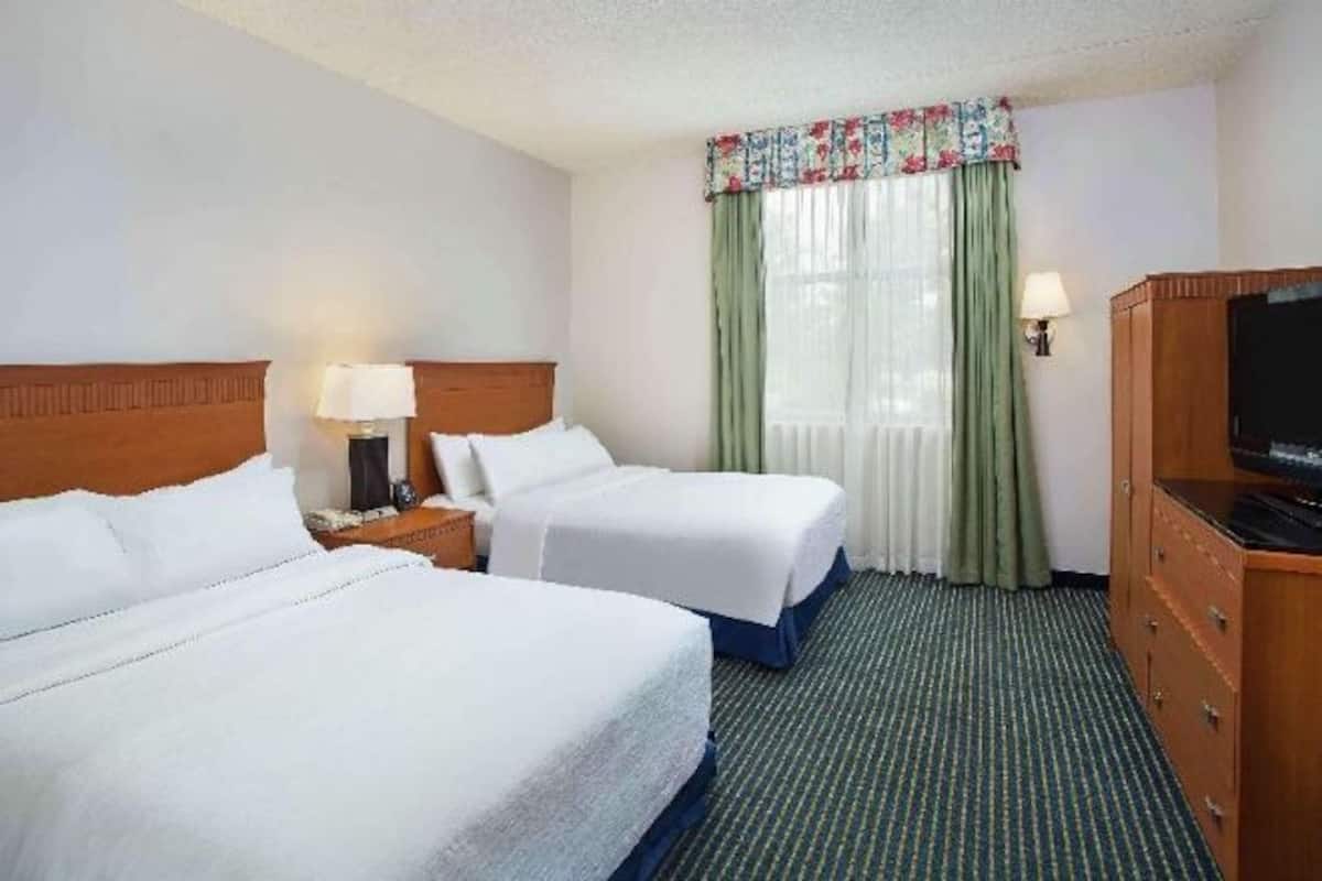 Premium bedding, down duvets, pillow-top beds, in-room safe