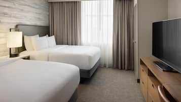 Premium bedding, down comforters, pillowtop beds, in-room safe