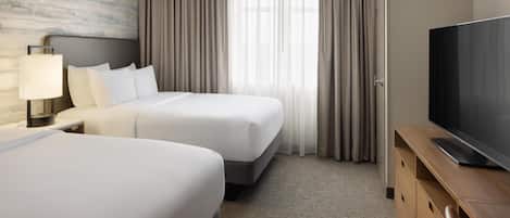 Premium bedding, down duvets, pillow-top beds, in-room safe