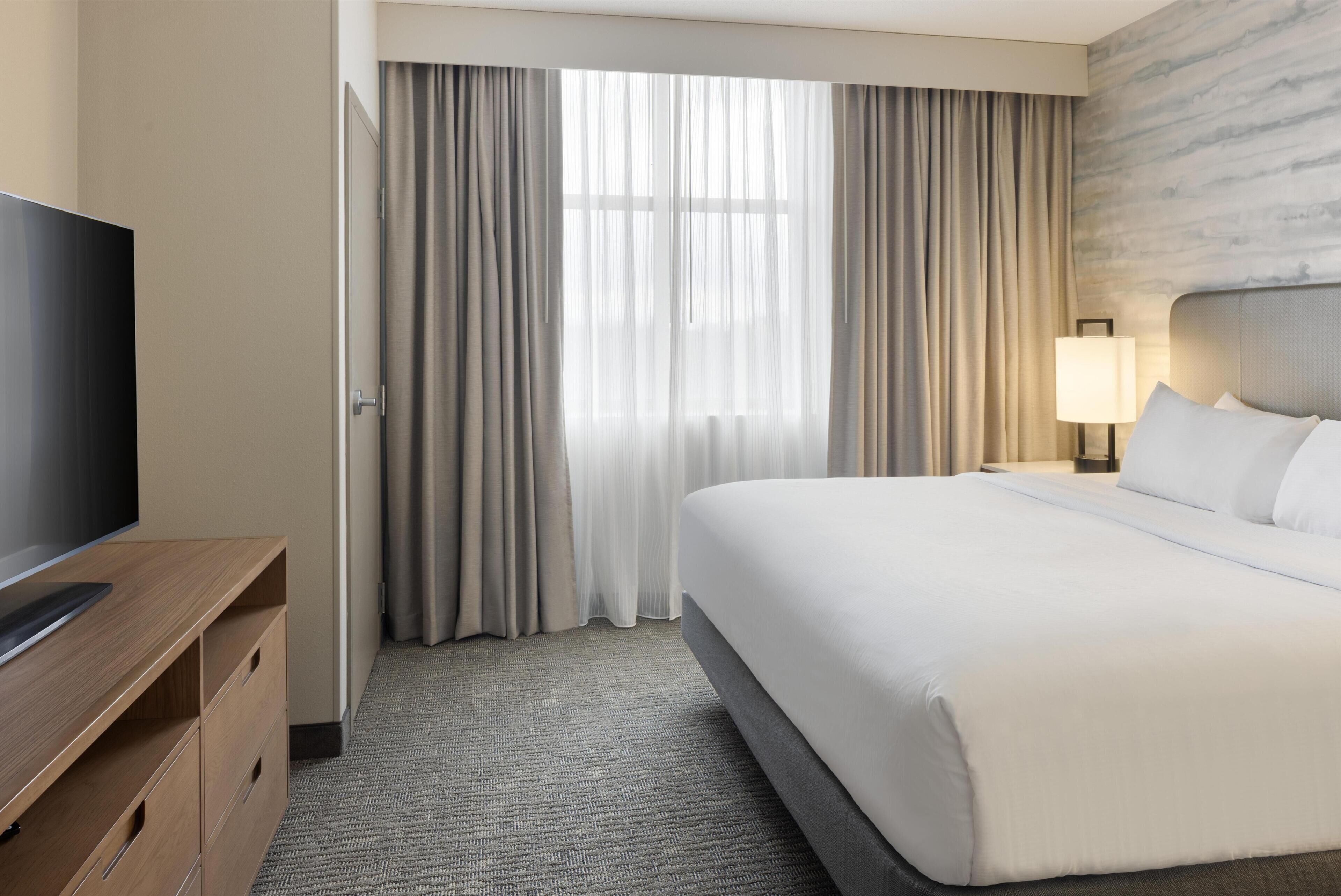 Premium bedding, down comforters, pillowtop beds, in-room safe