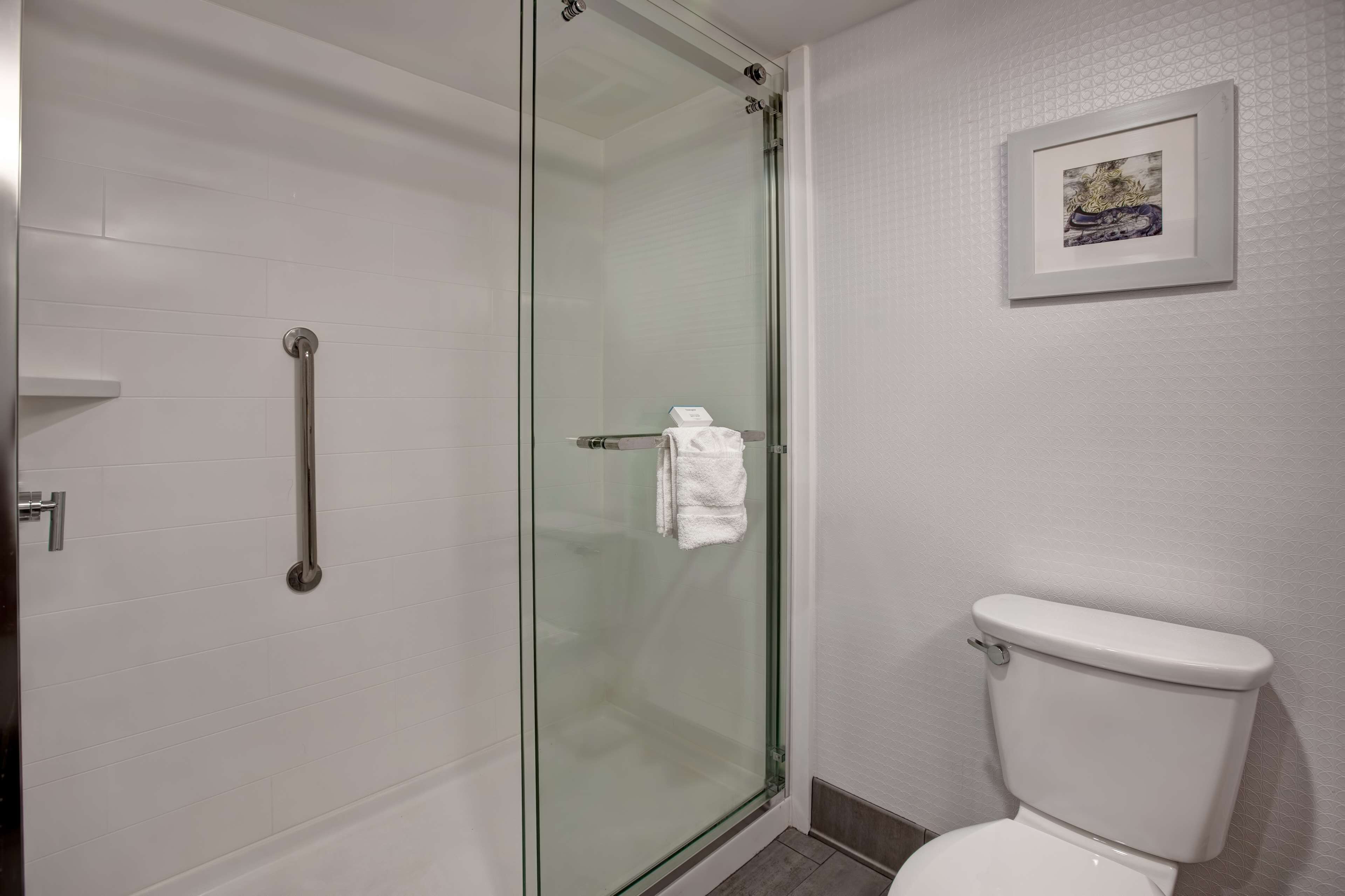 bathtub, hair dryer, towels