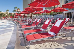 Beach cabanas, sun loungers, beach umbrellas, beach towels