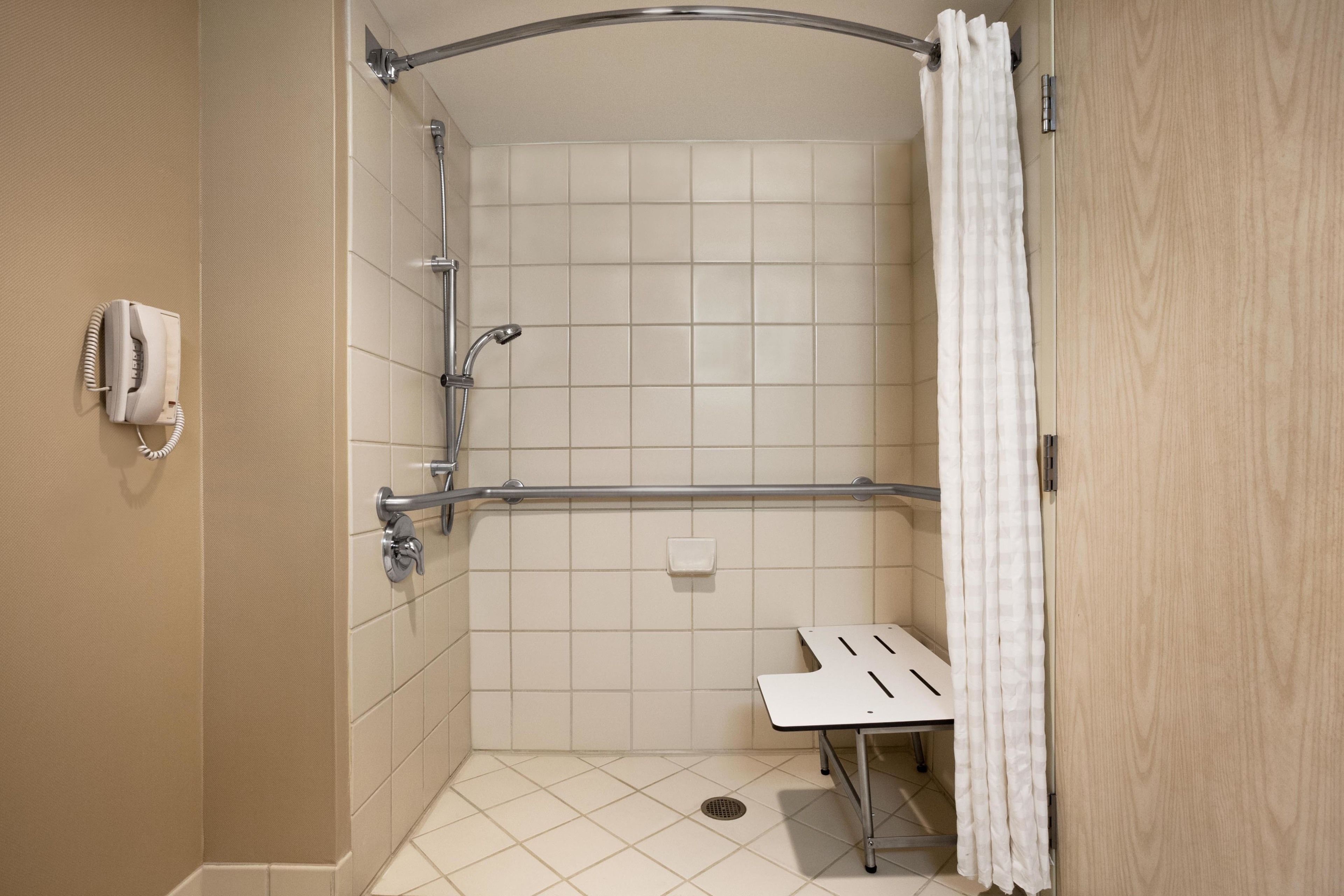 designer toiletries, hair dryer, towels