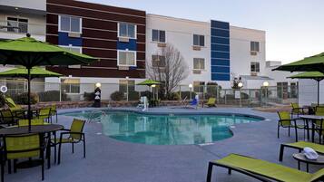 Outdoor pool, open 9:00 AM to 9:00 PM, pool umbrellas, sun loungers