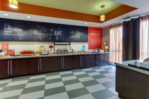 Enjoy a delicious breakfast at the breakfast area, featuring a self-service station with a variety of options.