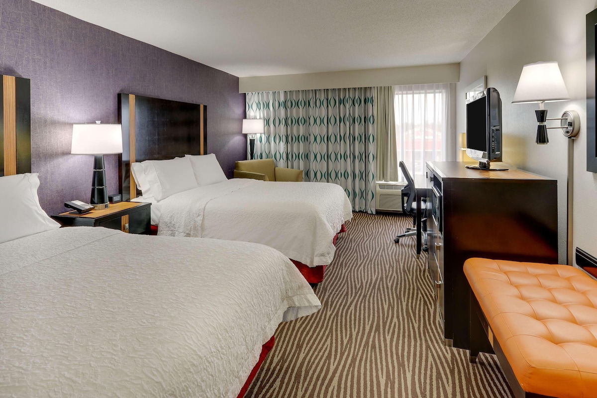 In-room safe, desk, iron/ironing board, cribs (free)