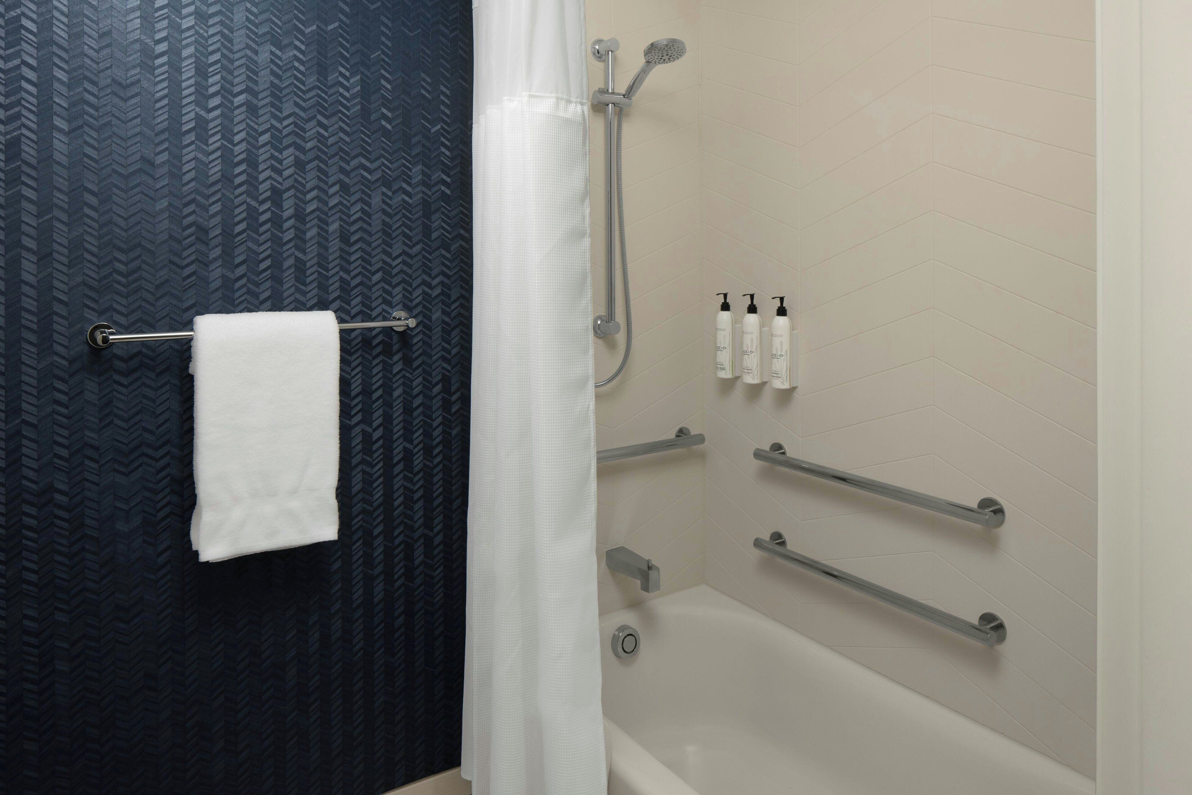 room, 2 queen beds | bathroom | combined shower/bathtub, free toiletries, hair dryer