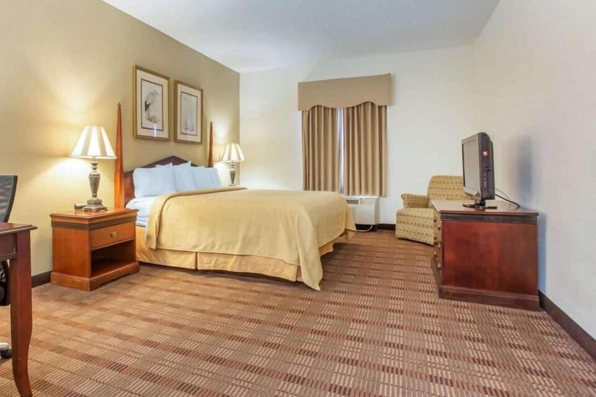 Premium bedding, memory foam beds, desk, laptop workspace