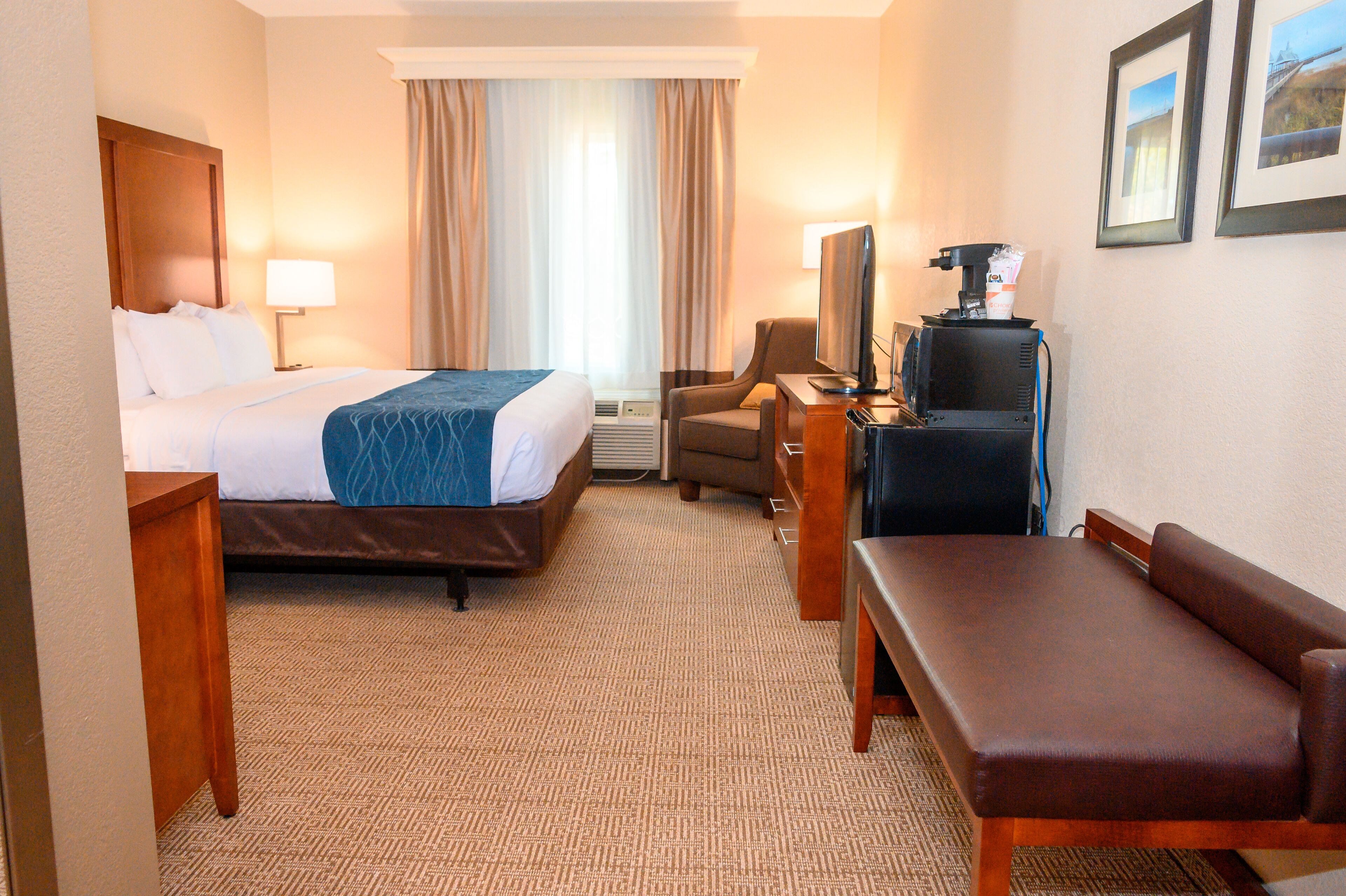 premium bedding, memory-foam beds, desk, laptop workspace