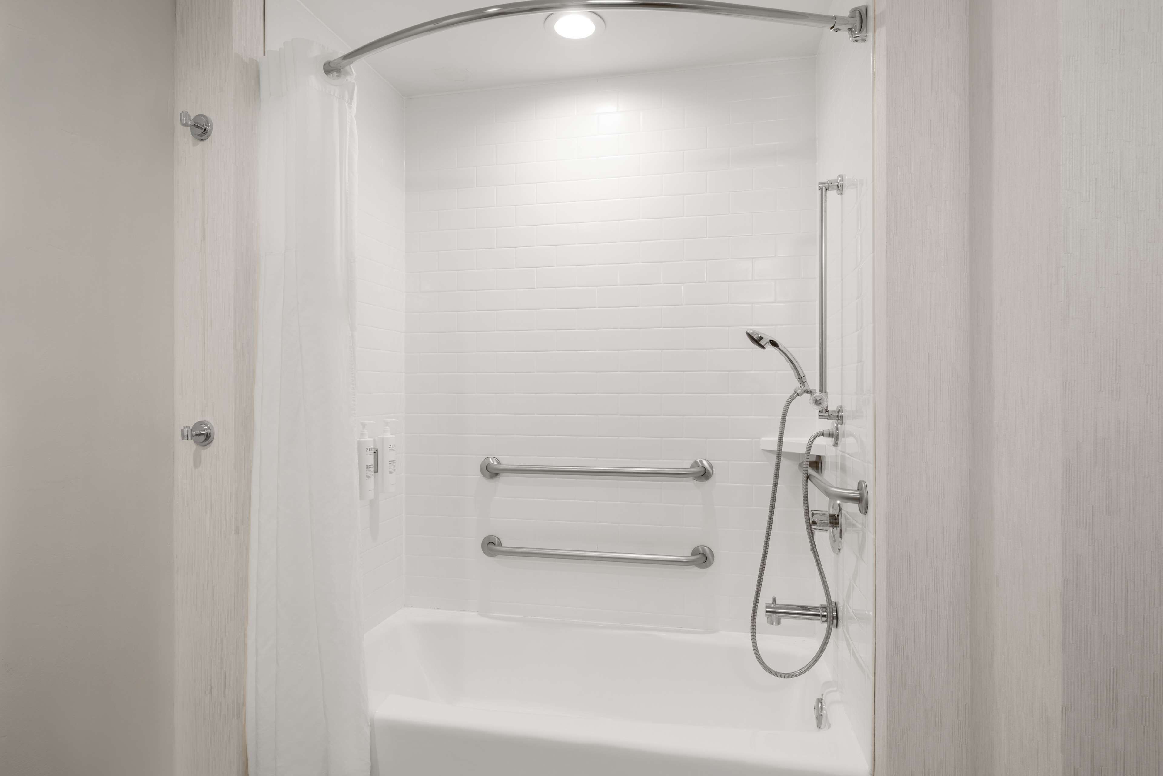 standard room, 1 king bed, non smoking, accessible | bathroom | free toiletries, hair dryer, towels, soap