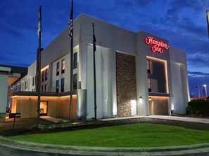 A Hampton Inn hotel with a modern facade, large windows, and a well-lit entrance. - Hampton Inn Santee-I-95 (Santee)