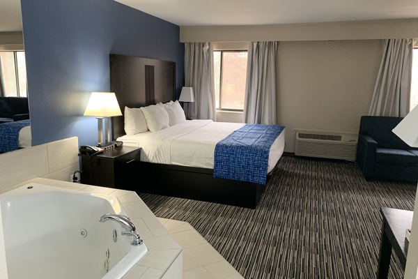 Suite, 1 King Bed, Non Smoking, Jetted Tub | Desk, iron/ironing board, free cribs/infant beds, free WiFi