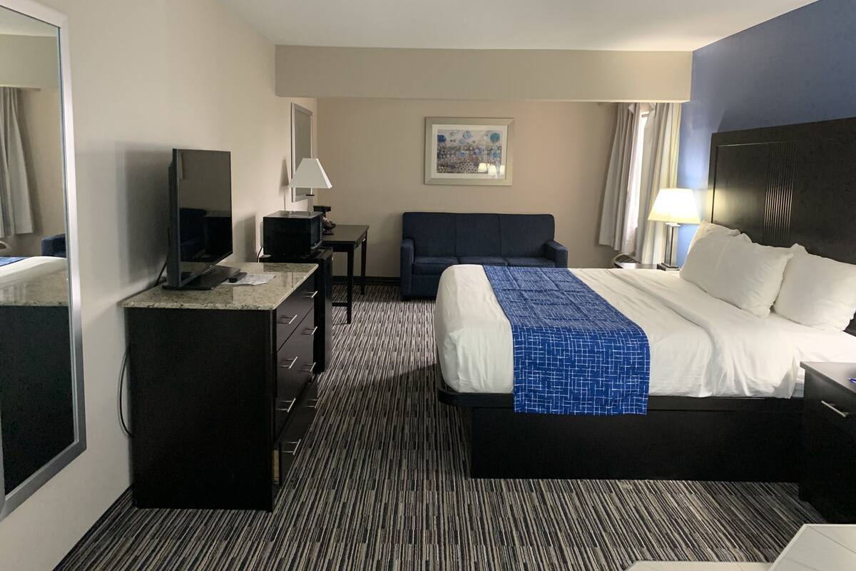 Desk, iron/ironing board, cribs (free), WiFi (free)