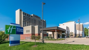 A Holiday Inn Express hotel with a modern design, featuring a large building with a flat roof and a prominent entrance. - Holiday Inn Express Springfield by IHG (Springfield)