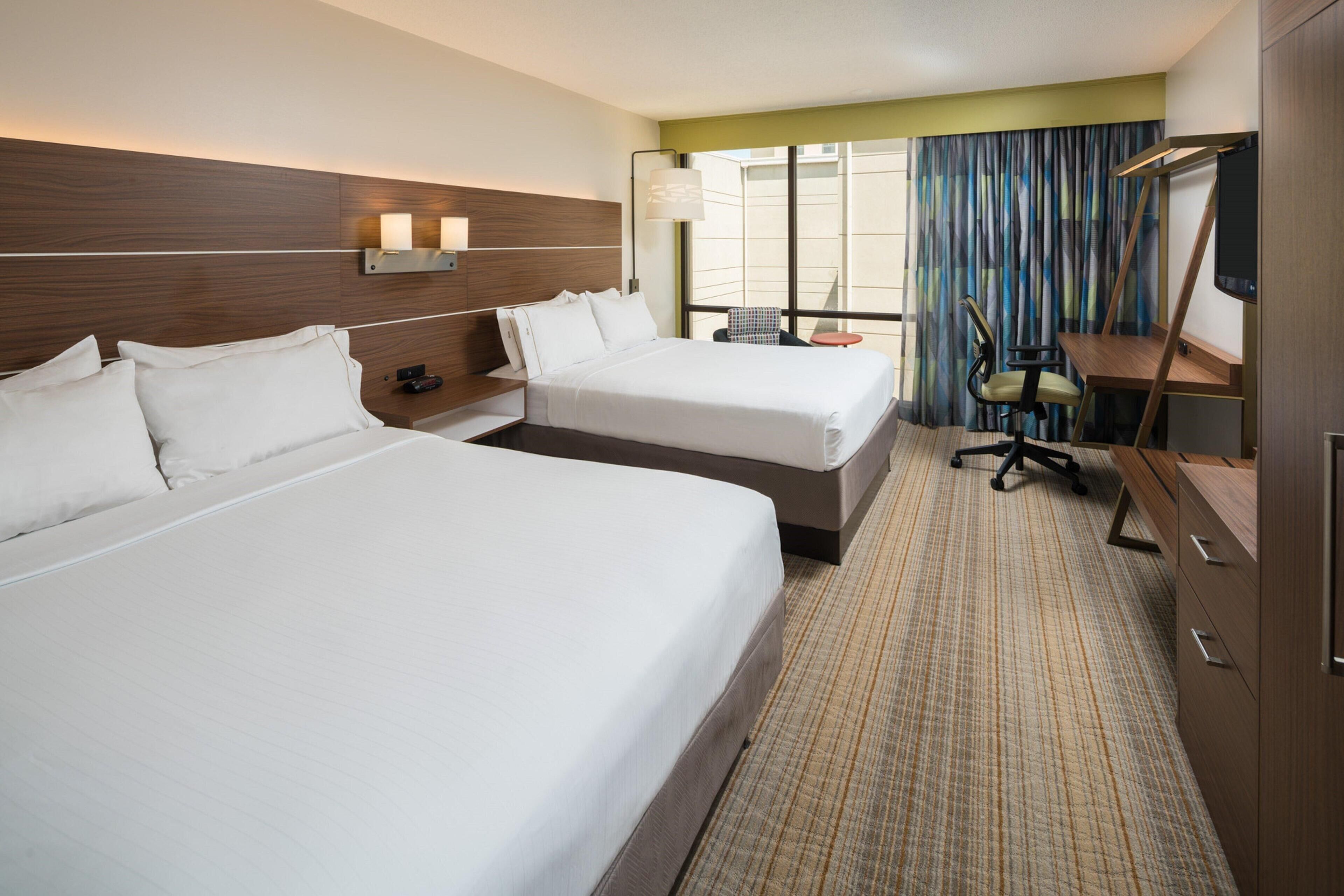 Premium bedding, down comforters, desk, laptop workspace