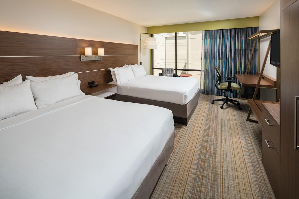 Premium bedding, down comforters, desk, laptop workspace