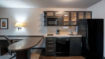 Full-sized fridge, microwave, stovetop, dishwasher
