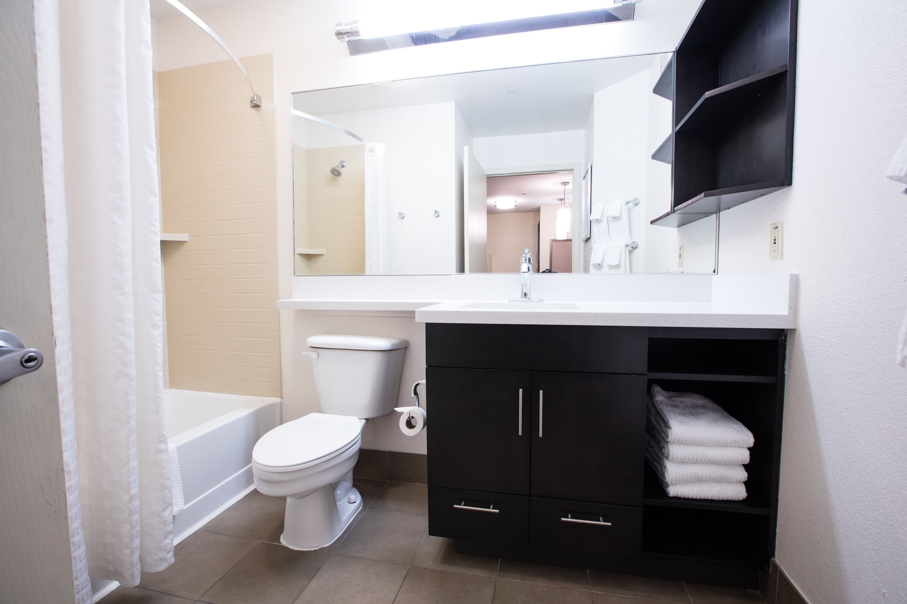 combined shower/bathtub, free toiletries, hair dryer, towels