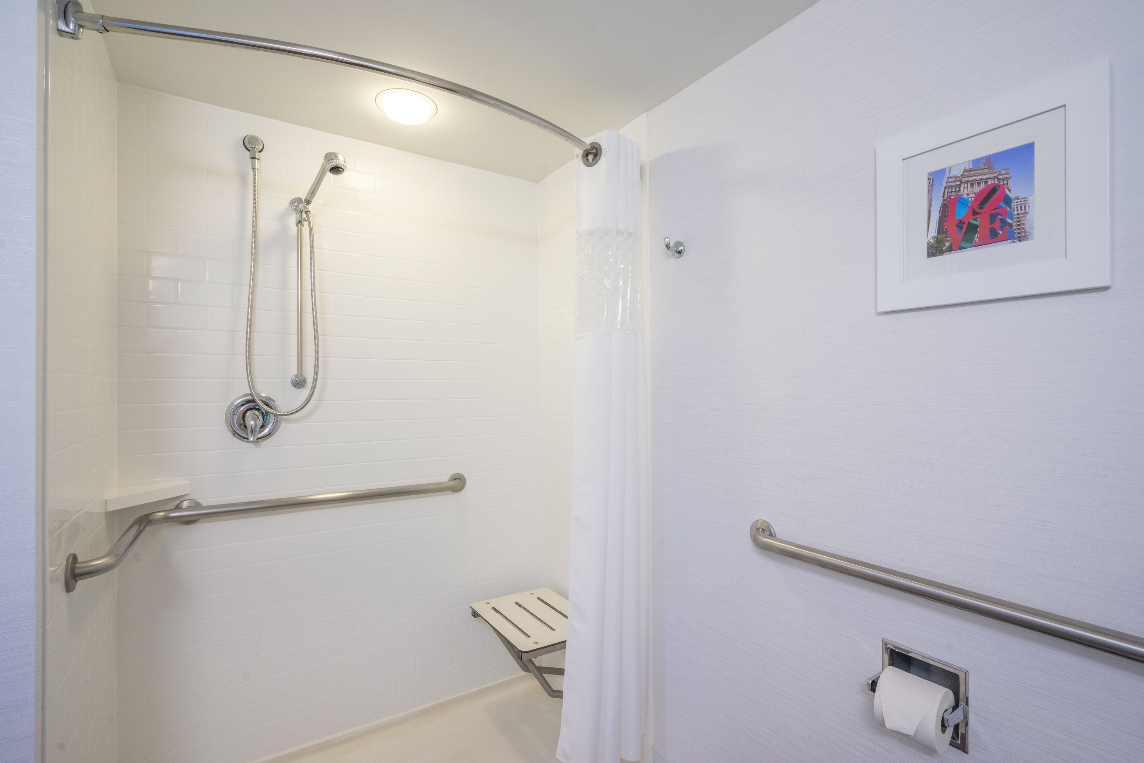 combined shower/bathtub, free toiletries, hair dryer, towels