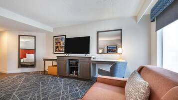 Studio Suite, 1 King Bed | Living area | 40-inch LCD TV with satellite channels, TV, MP3 dock