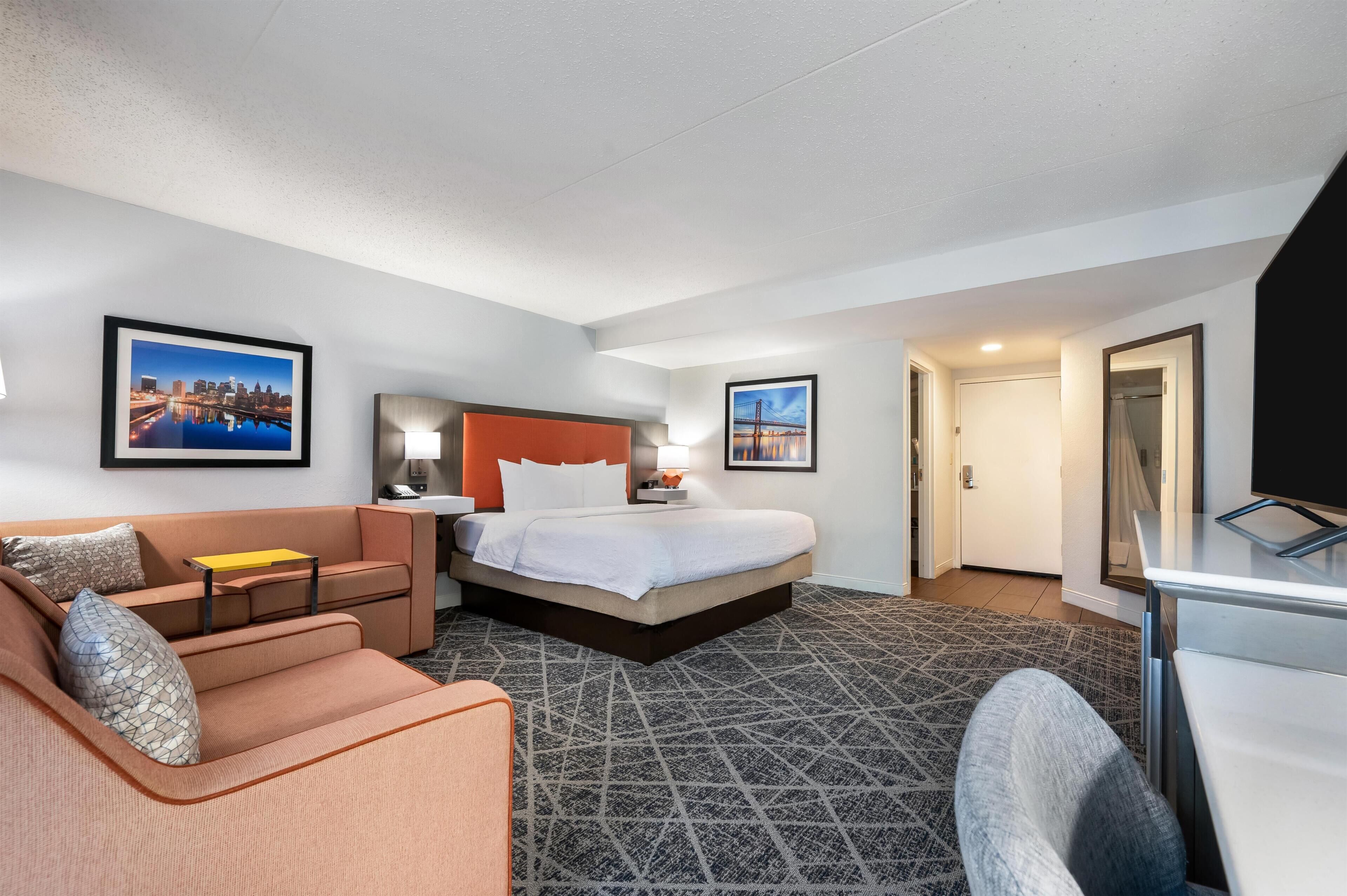 Studio Suite, 1 King Bed | Living area | 40-inch LCD TV with satellite channels, TV, MP3 dock