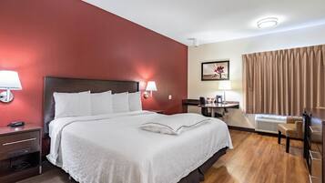 Premium Room, 1 King Bed (Upgraded Bedding & Snack, Smoke Free) | Premium bedding, blackout drapes, free cribs/infant beds, free WiFi