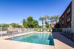 Outdoor pool, pool umbrellas, sun loungers