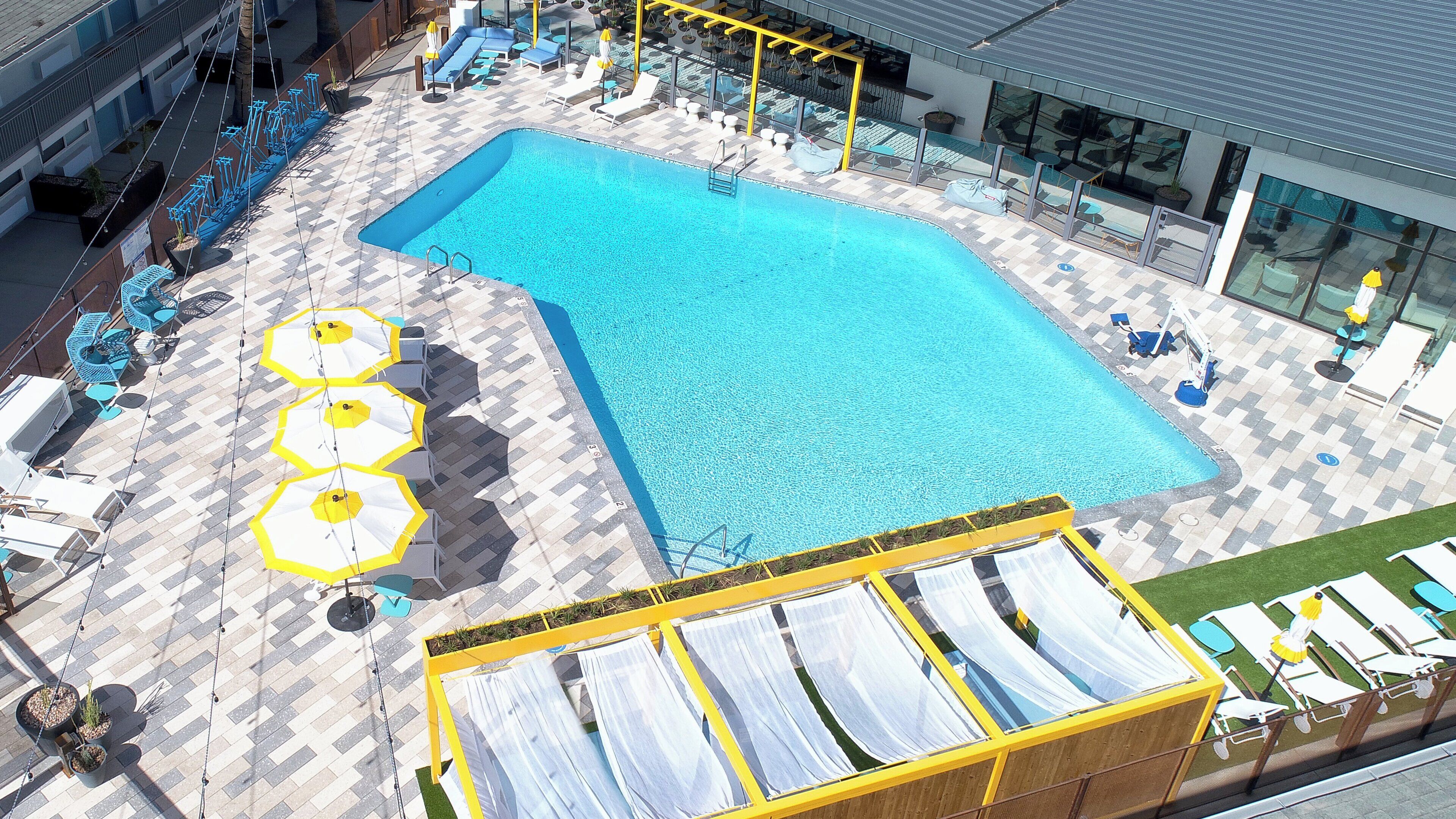 Outdoor pool, pool cabanas (surcharge), pool loungers