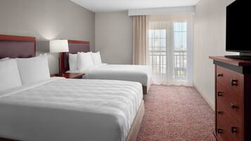 Premium bedding, pillowtop beds, desk, blackout drapes