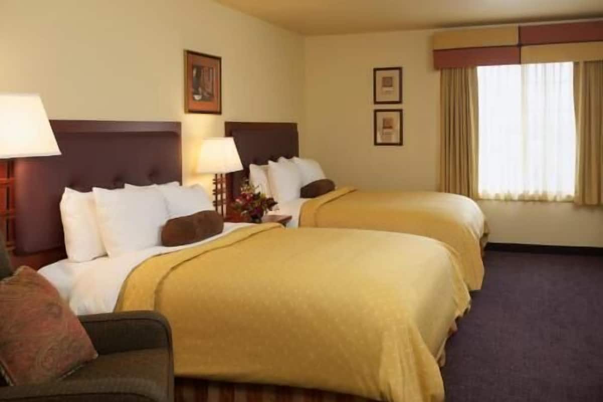 Premium bedding, pillowtop beds, desk, blackout drapes