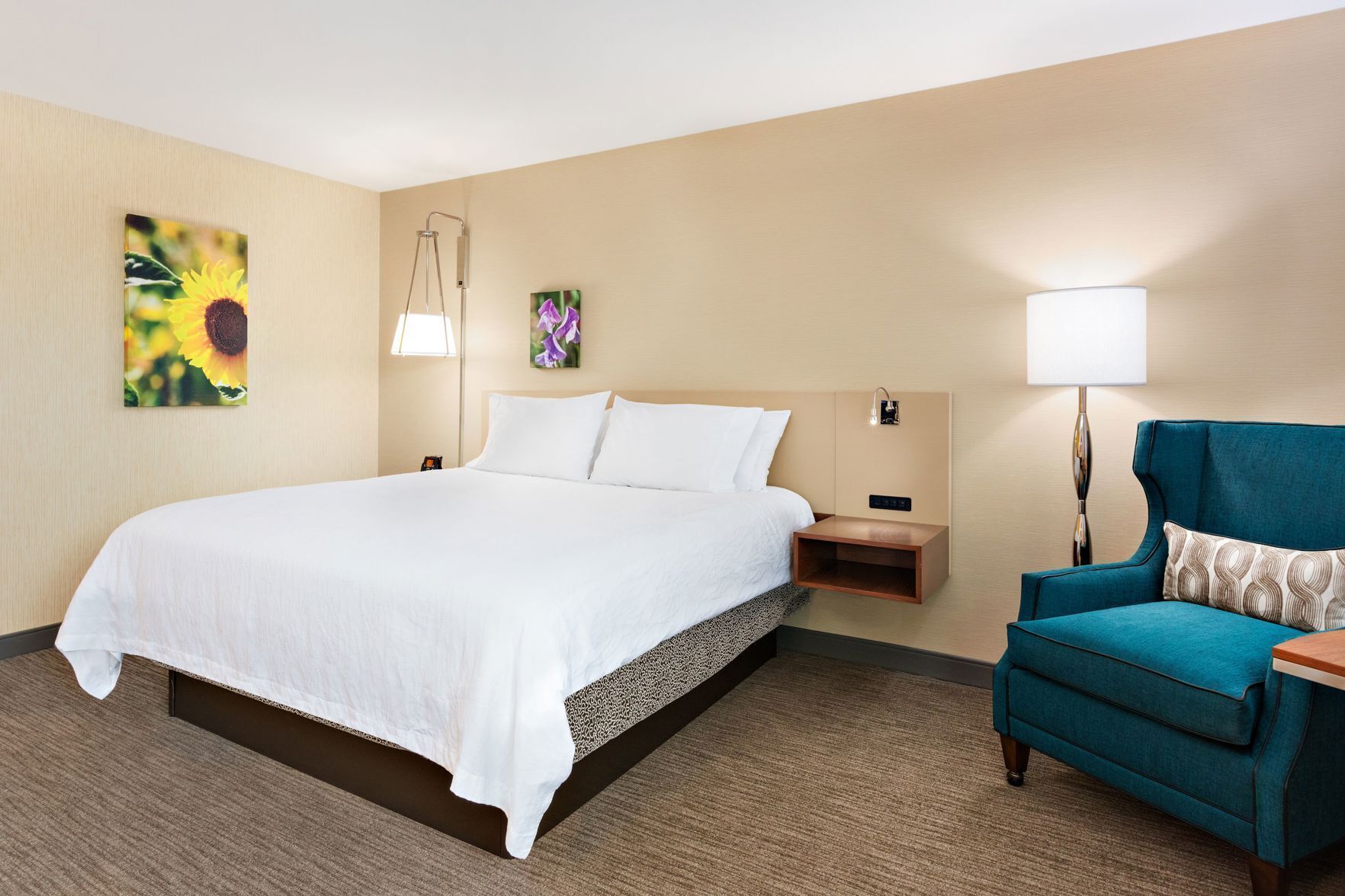 Premium bedding, desk, laptop workspace, iron/ironing board