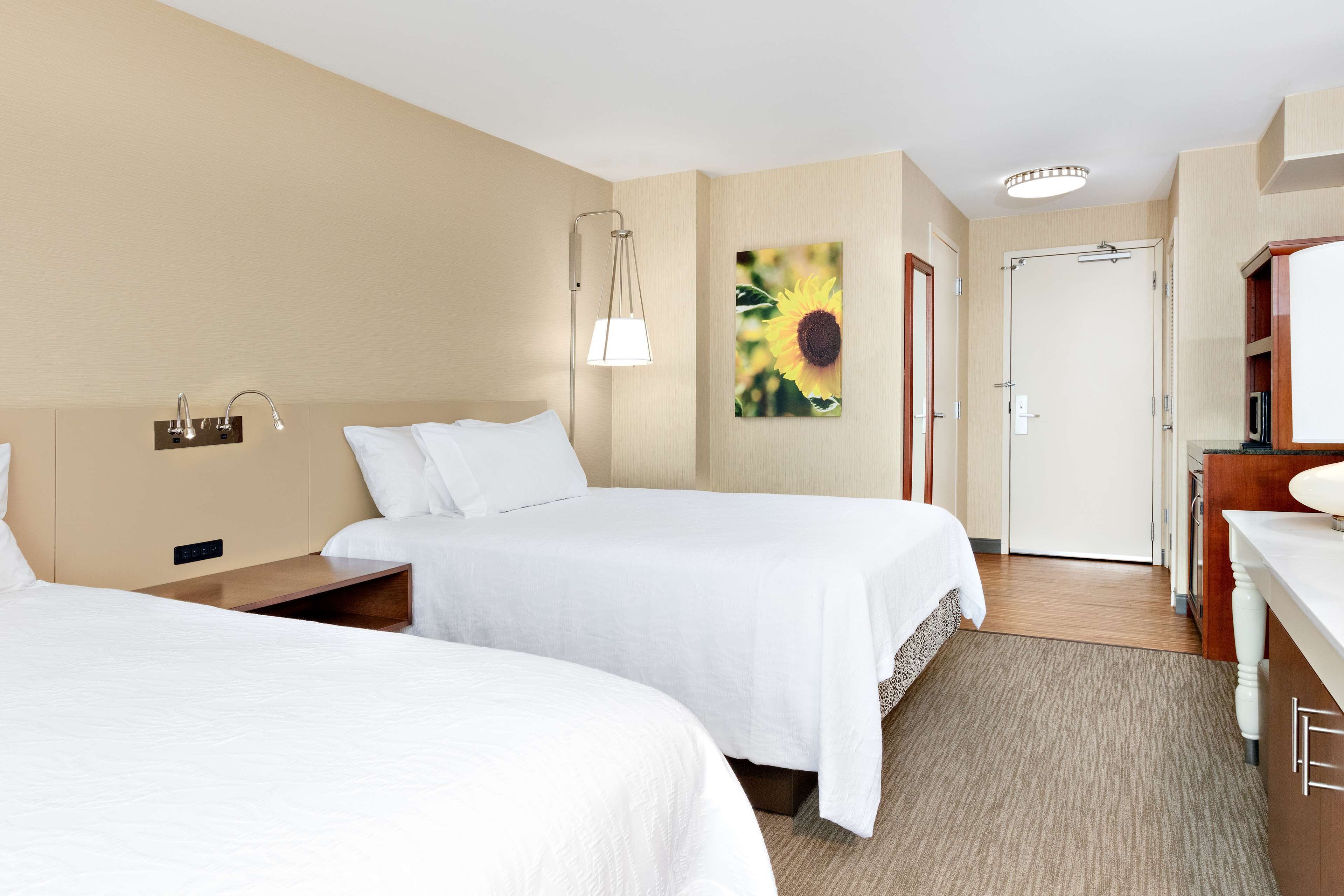 premium bedding, desk, laptop workspace, iron/ironing board